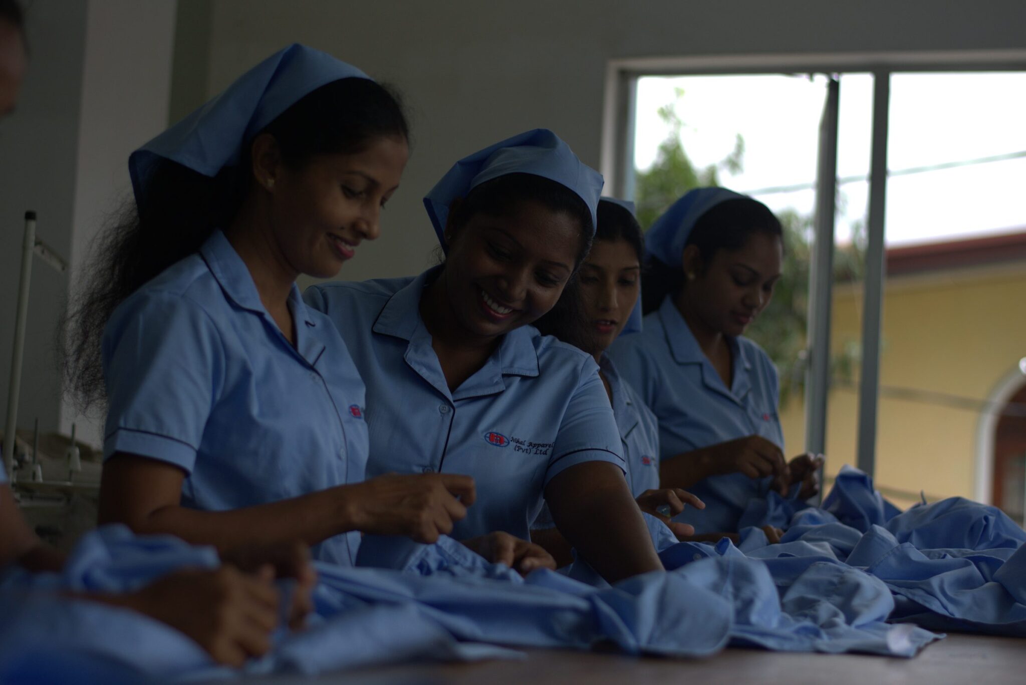 Master tailors at work in Nihal Apparels workshop